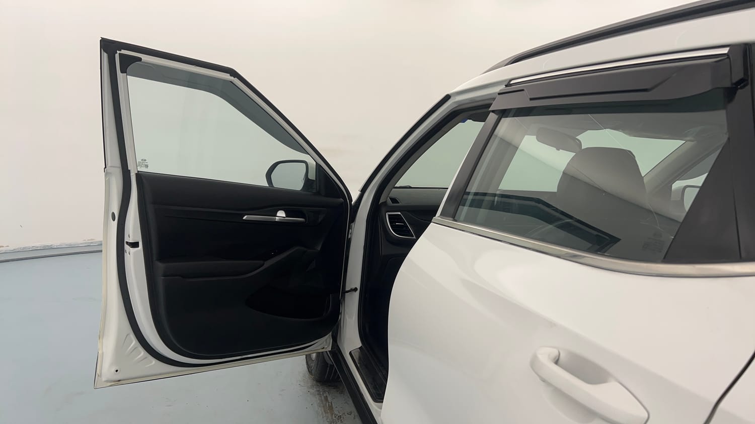 Used 2020 Kia Seltos HTK Plus 1.5 Petrol Manual interior LEFT FRONT DOOR OPEN VIEW