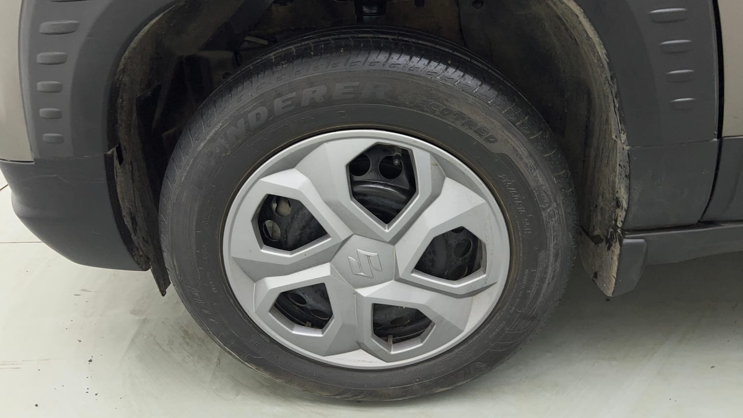 Used 2023 Maruti Suzuki Brezza VXi Petrol Manual tyres LEFT FRONT TYRE RIM VIEW