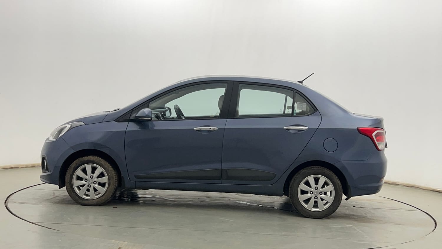 Used 2014 Hyundai Xcent SX 1.2 Petrol Manual exterior LEFT SIDE VIEW