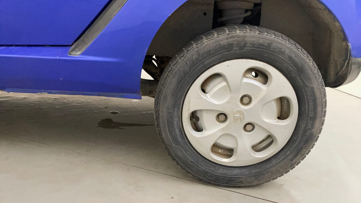 Used 2014 Tata Nano LX Petrol Manual tyres LEFT REAR TYRE RIM VIEW
