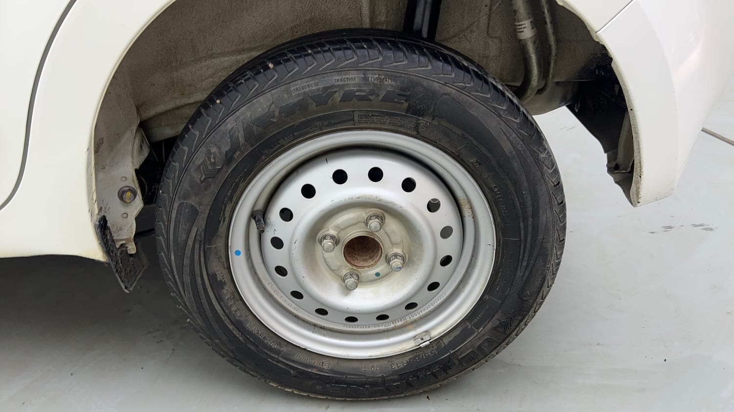 Used 2023 Maruti Suzuki Wagon R LXI 1.0 Petrol Manual tyres LEFT REAR TYRE RIM VIEW