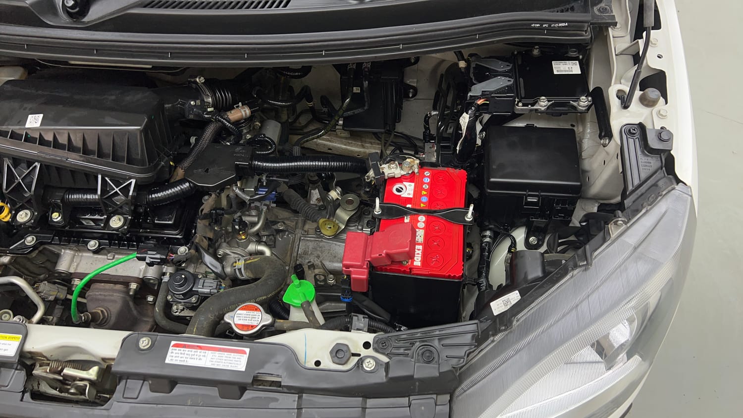 Used 2023 Maruti Suzuki Wagon R LXI 1.0 Petrol Manual engine ENGINE LEFT SIDE VIEW