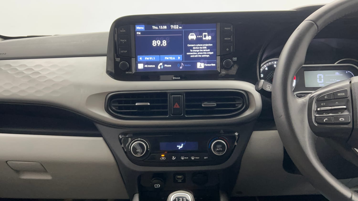 Used 2022 Hyundai Grand i10 Nios Asta 1.2 Kappa VTVT Petrol Manual top_features Integrated (in-dash) music system