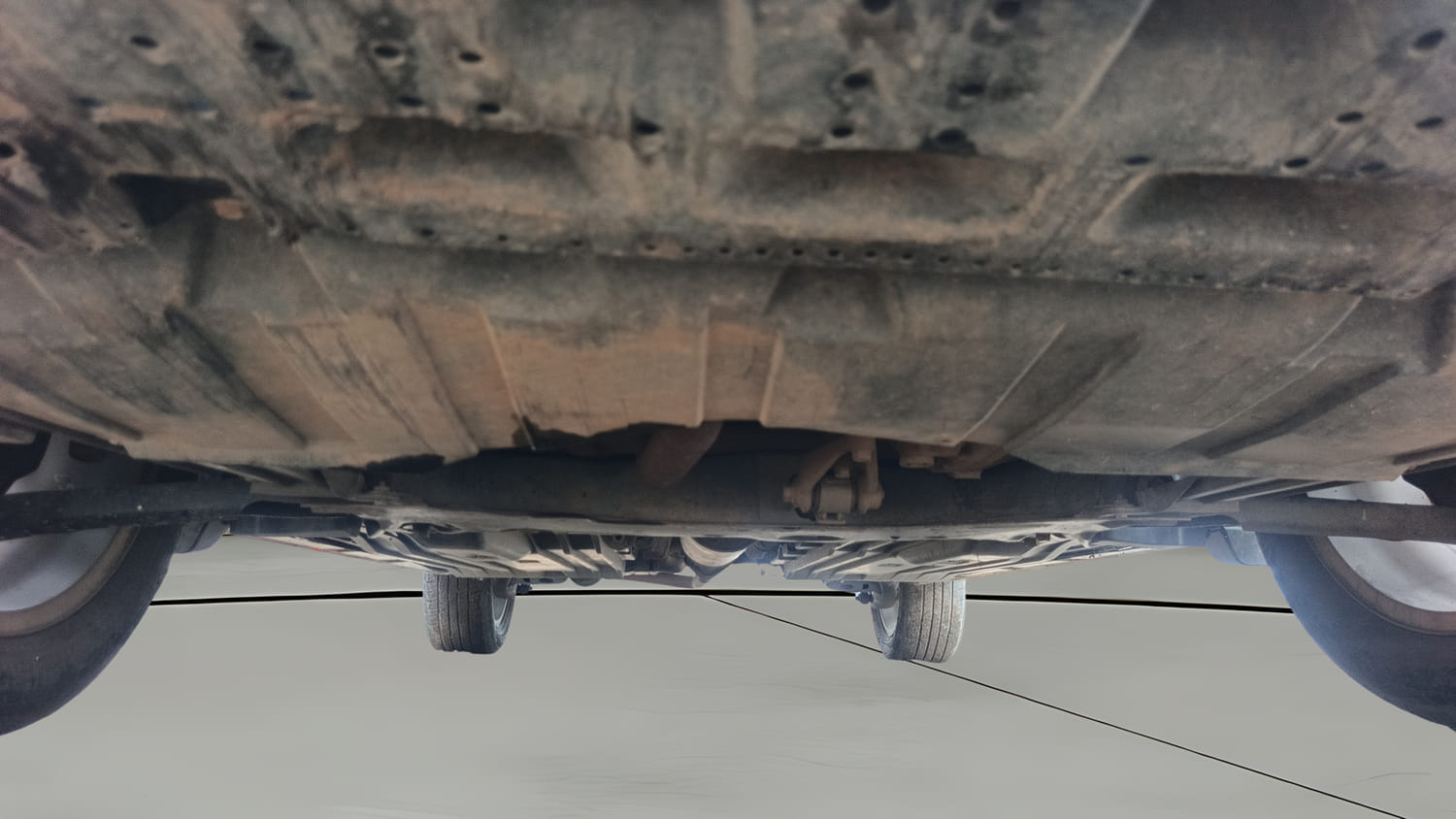 Used 2022 Maruti Suzuki Grand Vitara Alpha Smart Hybrid AT Petrol Automatic extra FRONT LEFT UNDERBODY VIEW