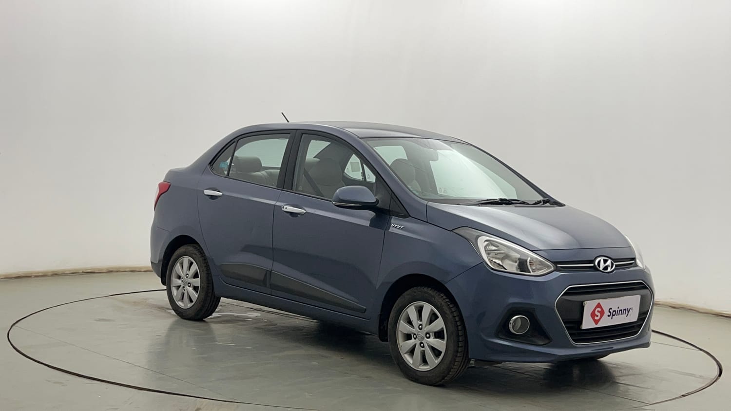 Used 2014 Hyundai Xcent SX 1.2 Petrol Manual exterior RIGHT FRONT CORNER VIEW