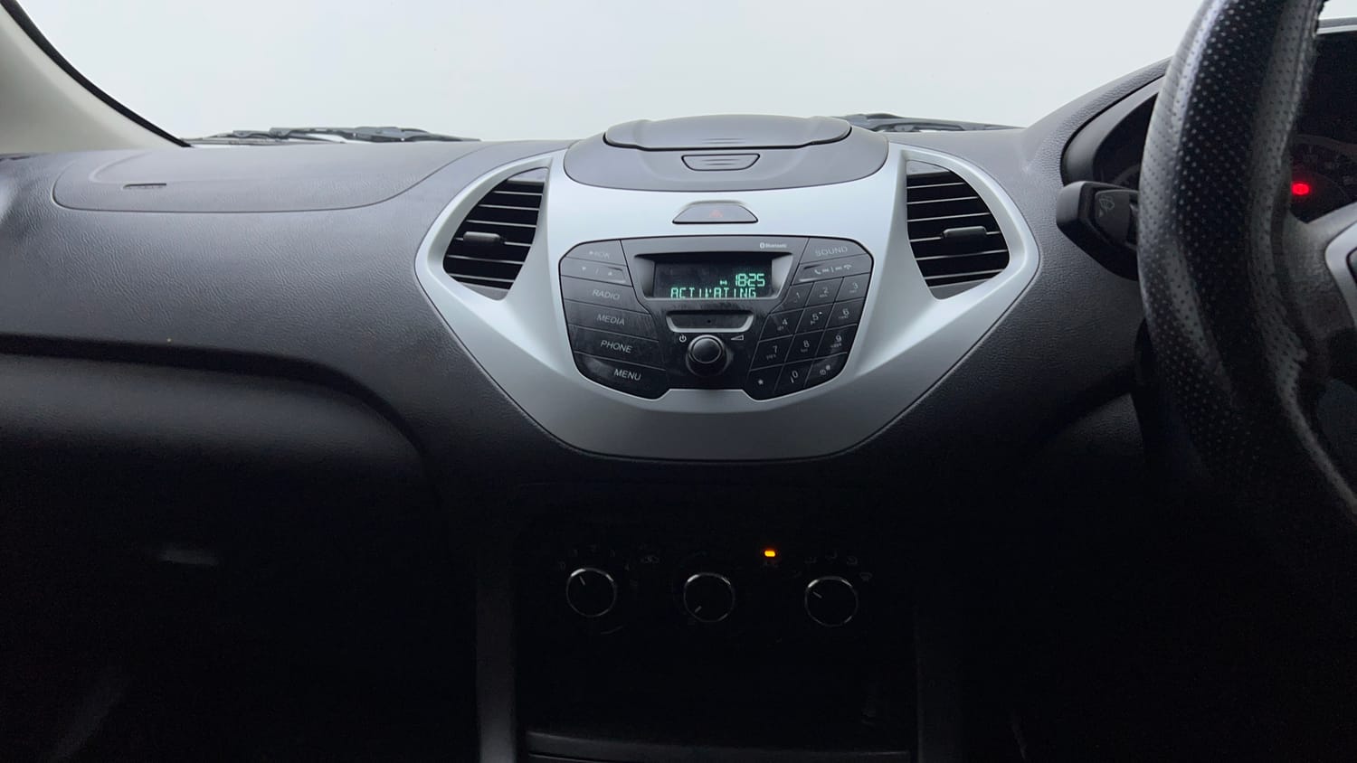 Used 2016 Ford Figo Trend 1.2 Ti-VCT Petrol Manual interior MUSIC SYSTEM & AC CONTROL VIEW