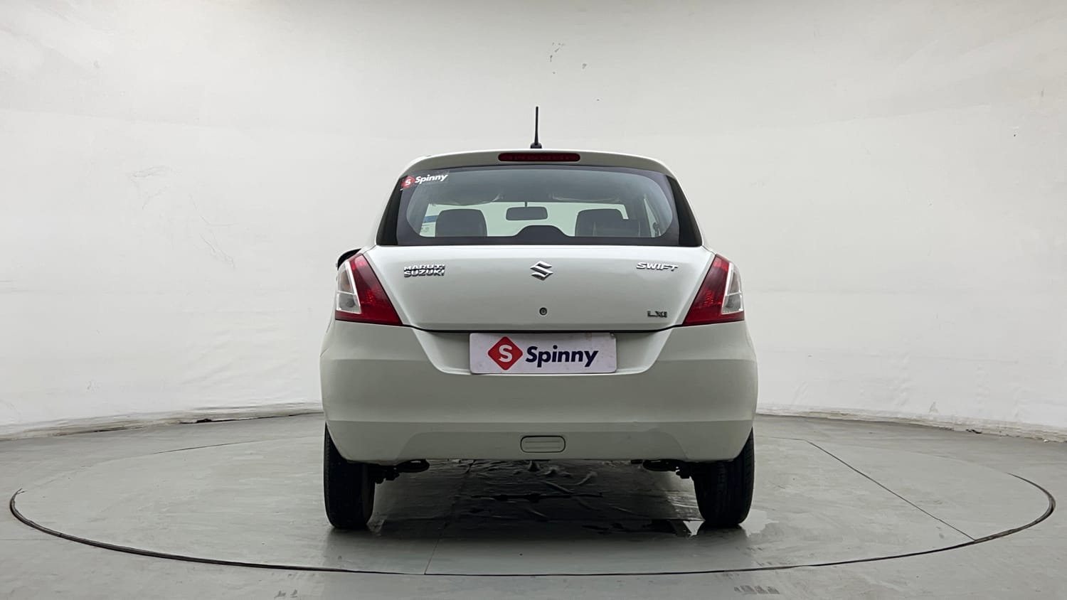 Used 2015 Maruti Suzuki Swift Lxi (O) Petrol Manual exterior BACK VIEW