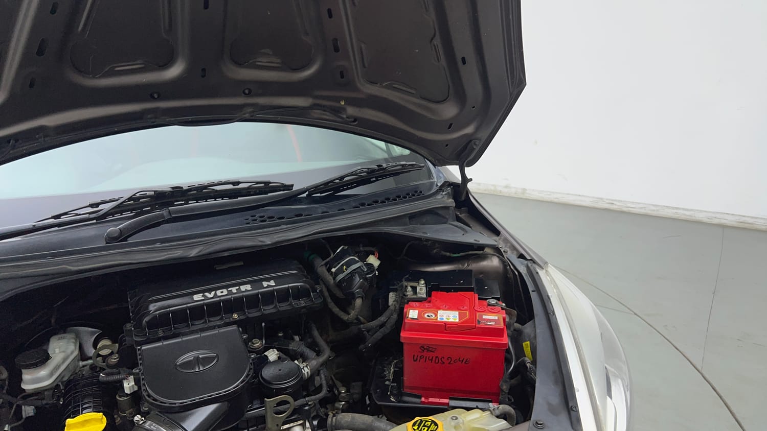 Used 2018 Tata Tiago XZ CNG (Outside Fitted) Cng Manual engine ENGINE LEFT SIDE HINGE & APRON VIEW