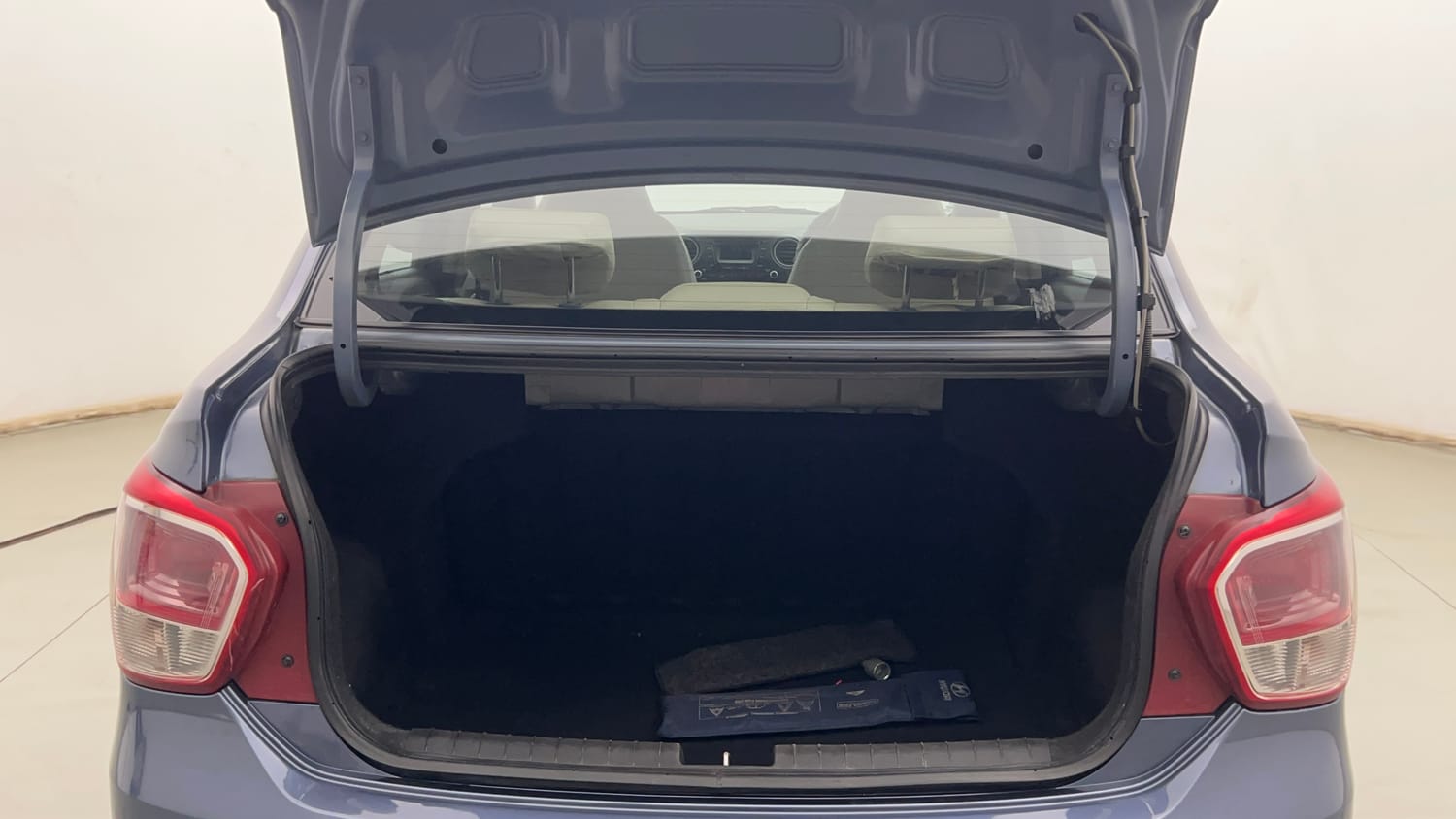 Used 2014 Hyundai Xcent SX 1.2 Petrol Manual interior DICKY INSIDE VIEW