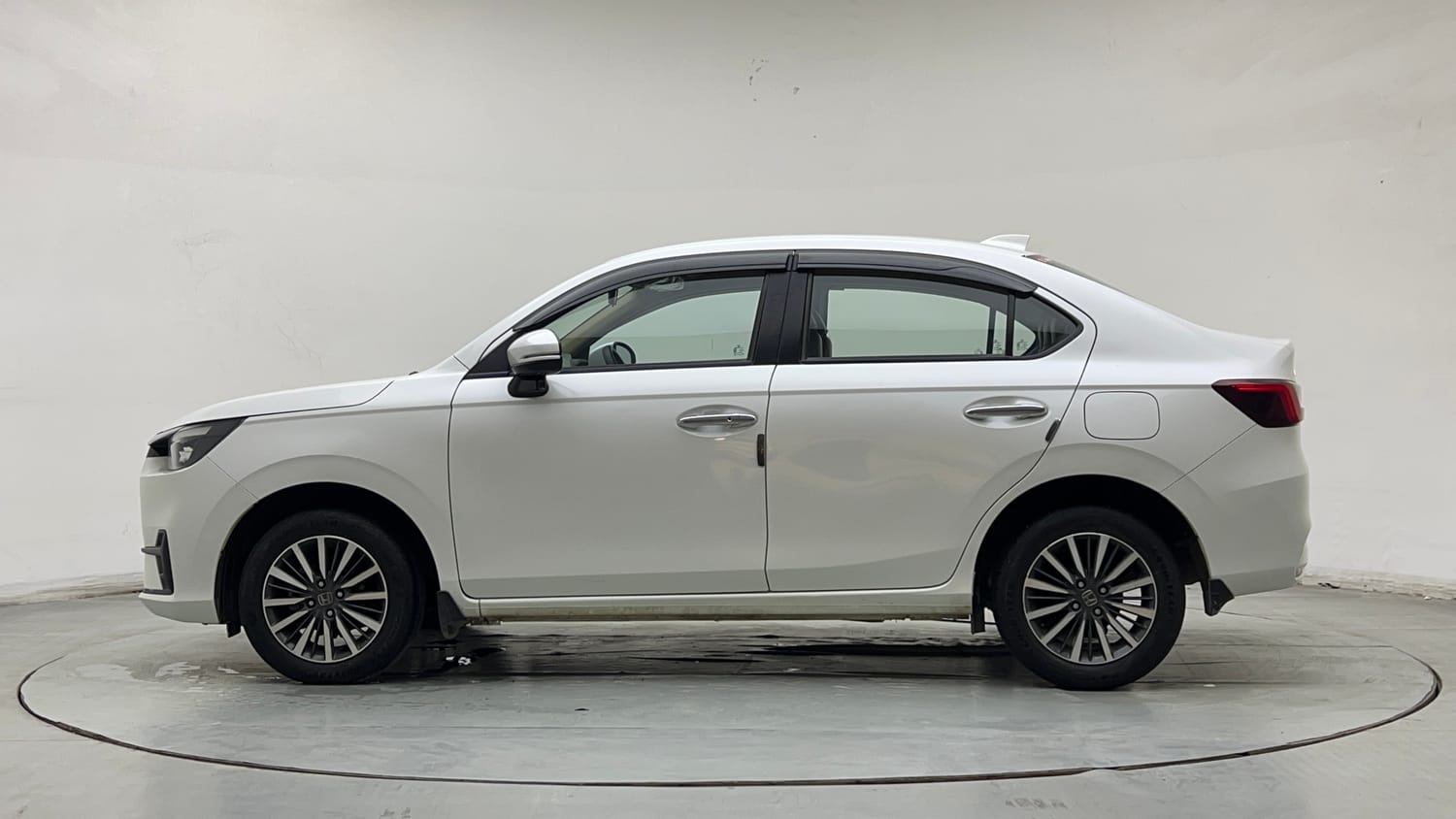 Used 2025 Honda Amaze ZX 1.2 Petrol CVT Petrol Automatic exterior LEFT SIDE VIEW