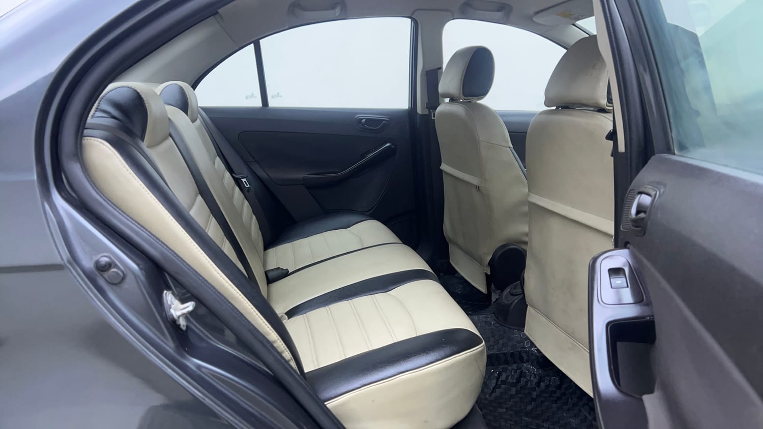 Used 2016 Tata Zest XMS Petrol Petrol Manual interior RIGHT SIDE REAR DOOR CABIN VIEW