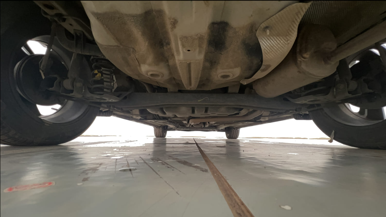 Used 2022 Hyundai New i20 Asta (O) 1.2 MT Petrol Manual extra REAR UNDERBODY VIEW (TAKEN FROM REAR)