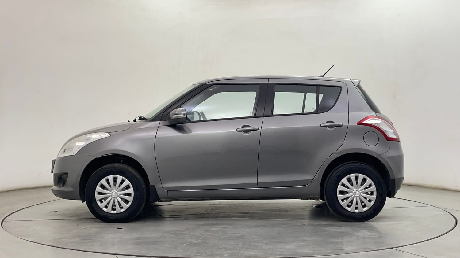 Used 2014 Maruti Suzuki Swift VXi Petrol Manual exterior LEFT SIDE VIEW