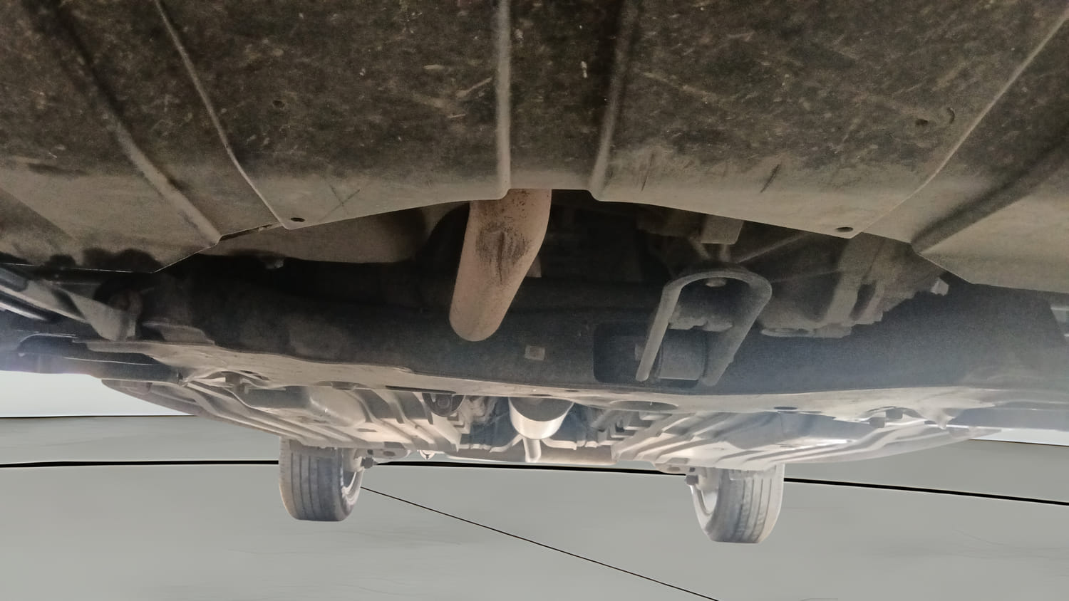 Used 2022 Maruti Suzuki Brezza ZXi Plus Petrol Manual extra FRONT LEFT UNDERBODY VIEW