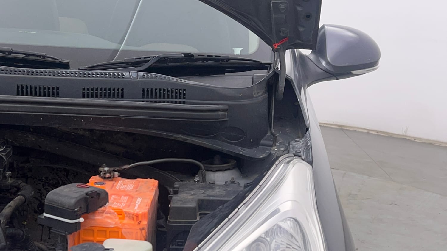 Used 2013 Hyundai Grand i10 Sportz 1.2 Kappa VTVT Petrol Manual engine ENGINE LEFT SIDE HINGE & APRON VIEW