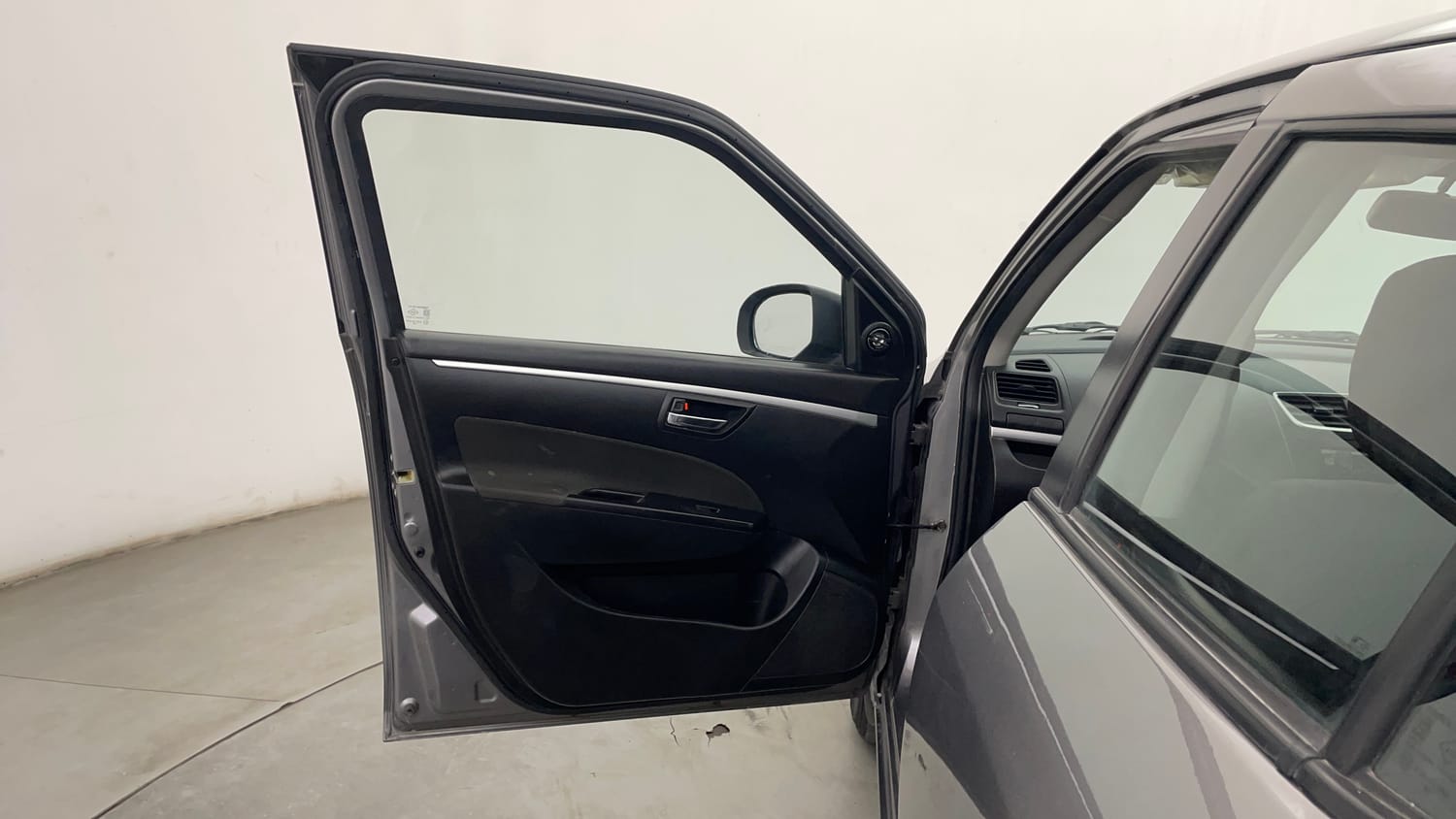 Used 2014 Maruti Suzuki Swift VXi Petrol Manual interior LEFT FRONT DOOR OPEN VIEW