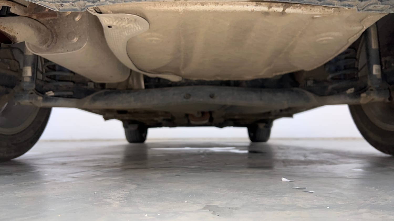 Used 2024 Volkswagen Taigun Highline 1.0 TSI MT Petrol Manual extra REAR UNDERBODY VIEW (TAKEN FROM REAR)