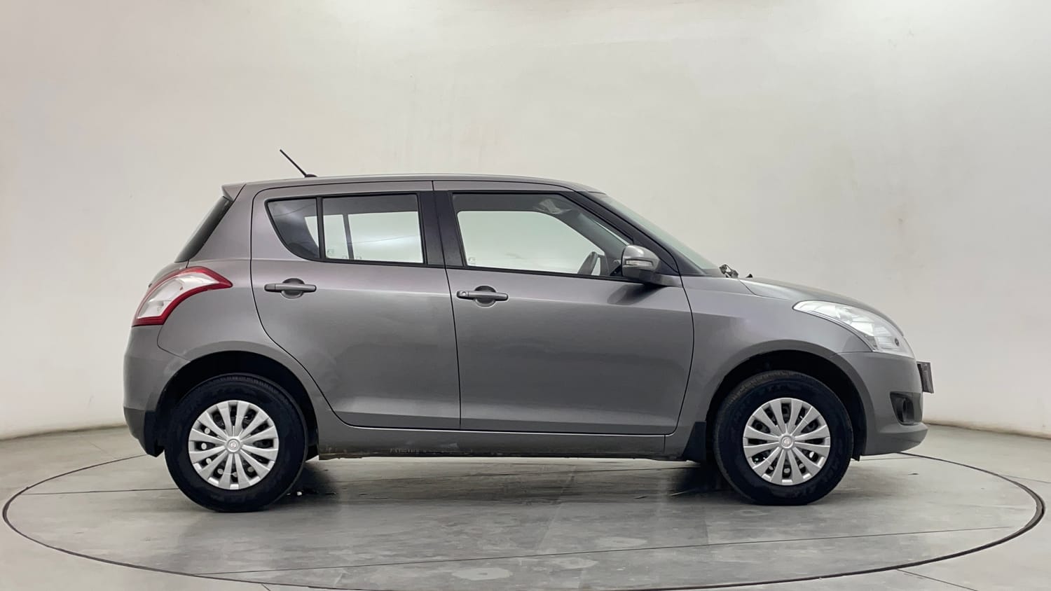 Used 2014 Maruti Suzuki Swift VXi Petrol Manual exterior RIGHT SIDE VIEW