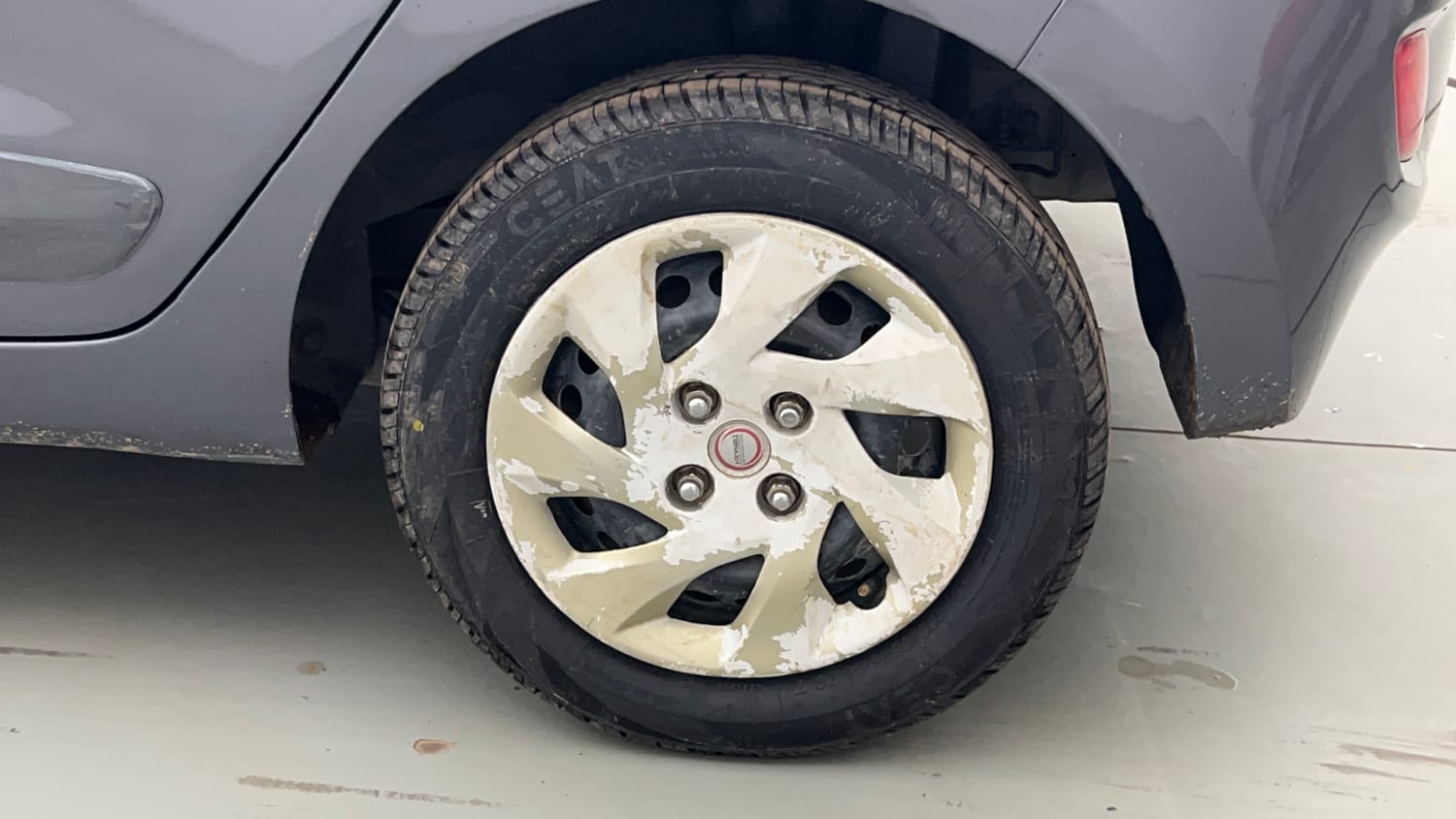 Used 2015 Hyundai Grand i10 Sportz 1.2 Kappa VTVT Petrol Manual tyres LEFT REAR TYRE RIM VIEW