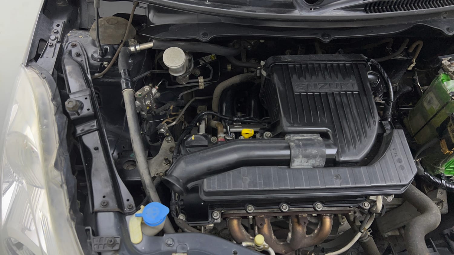 Used 2017 Maruti Suzuki Swift Lxi (O) Petrol Manual engine ENGINE RIGHT SIDE VIEW