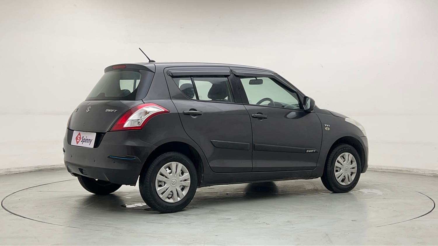 Used 2017 Maruti Suzuki Swift Lxi (O) Petrol Manual exterior RIGHT REAR CORNER VIEW