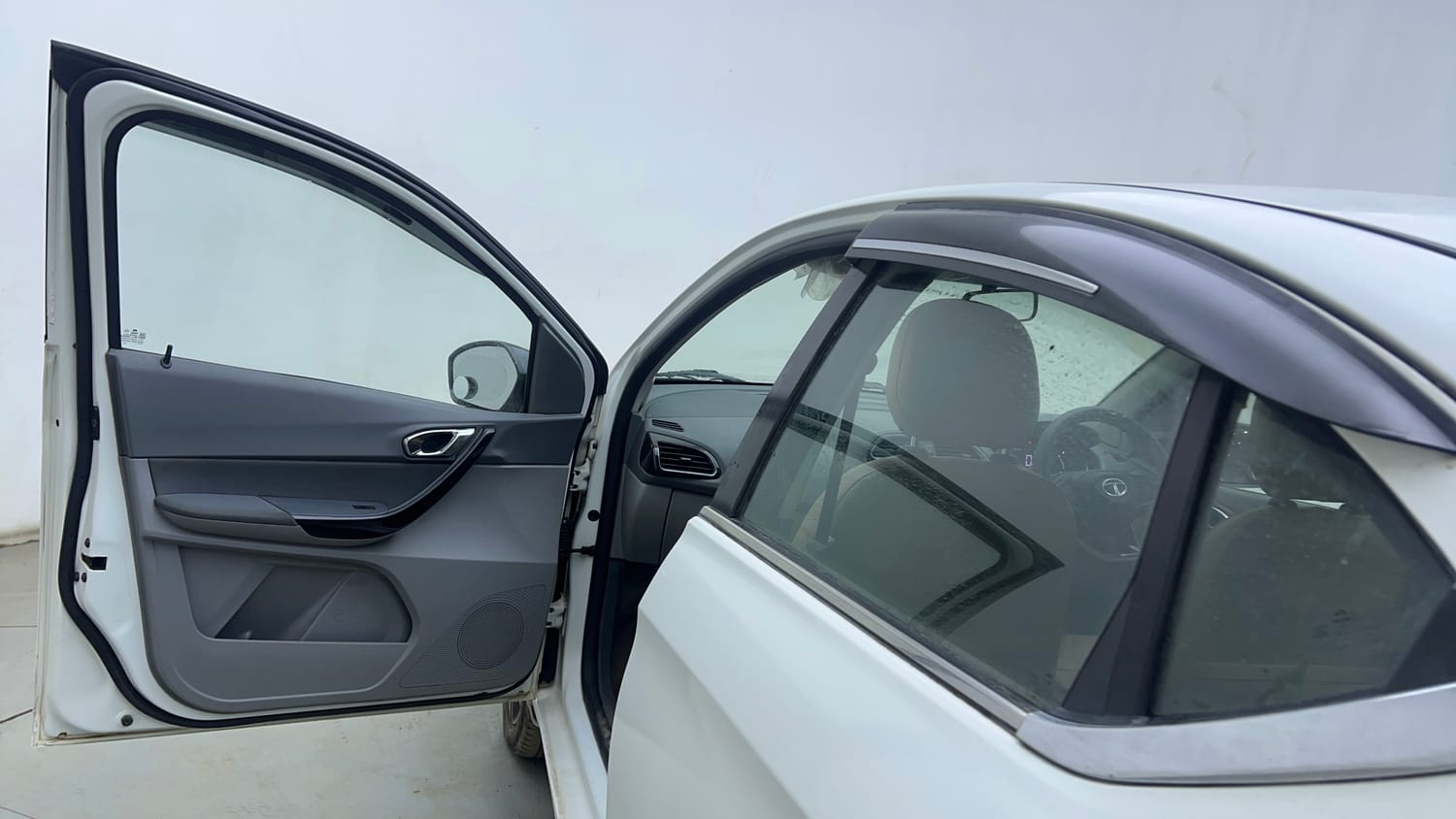 Used 2020 Tata Tigor XZ Plus Petrol Manual interior LEFT FRONT DOOR OPEN VIEW