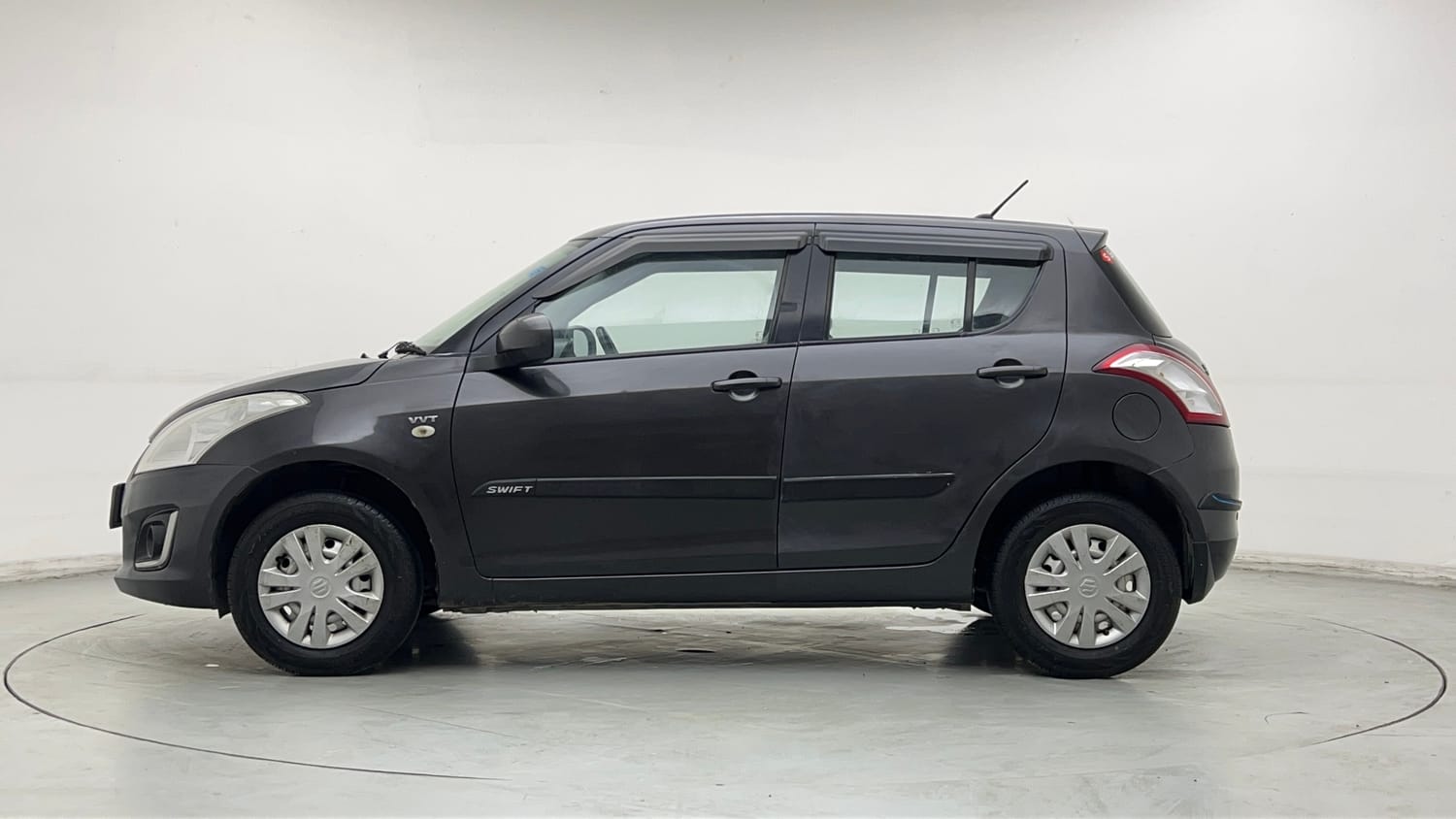 Used 2017 Maruti Suzuki Swift Lxi (O) Petrol Manual exterior LEFT SIDE VIEW