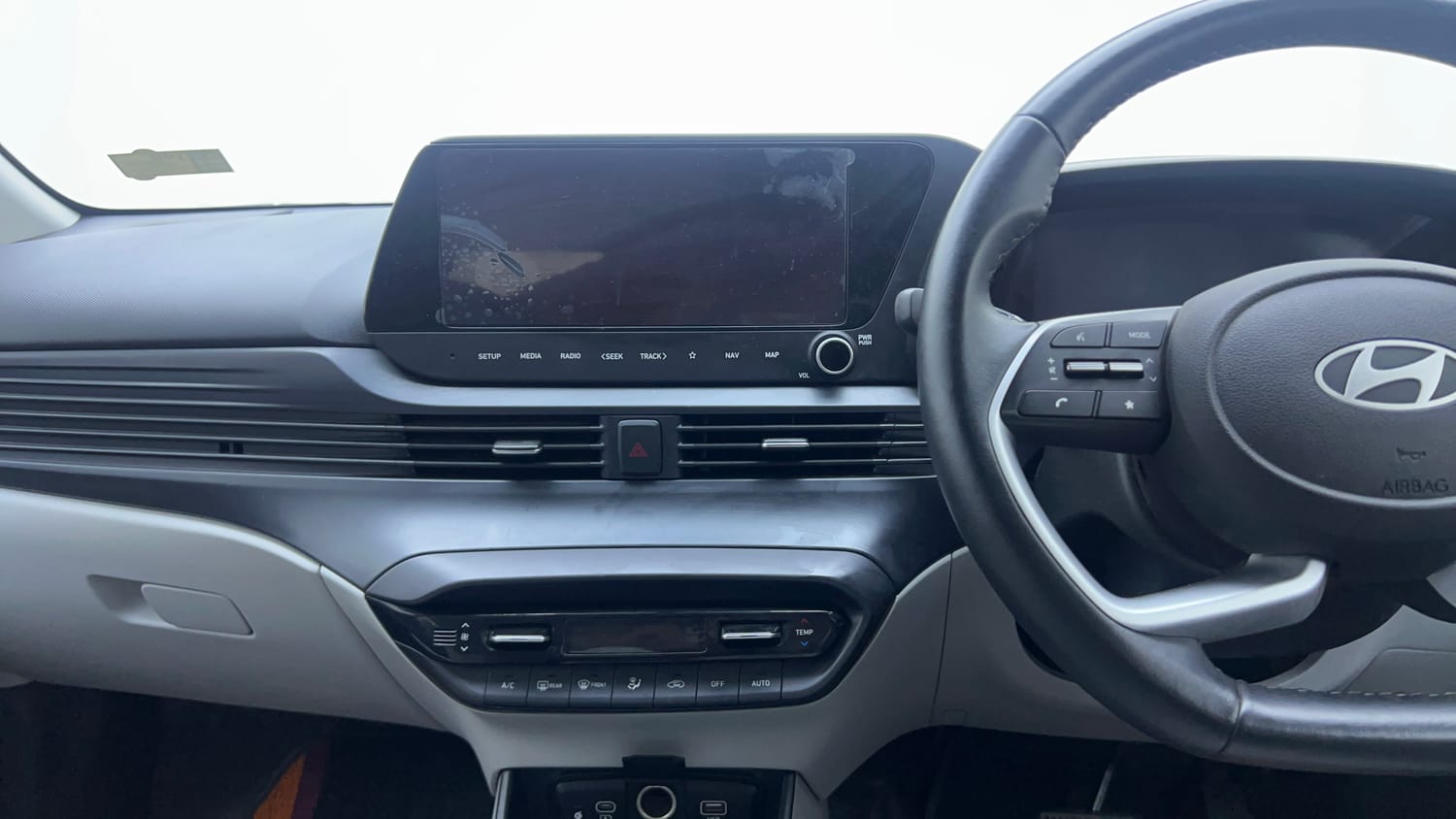 Used 2024 Hyundai New i20 Asta (O) 1.2 IVT Petrol Automatic interior MUSIC SYSTEM & AC CONTROL VIEW