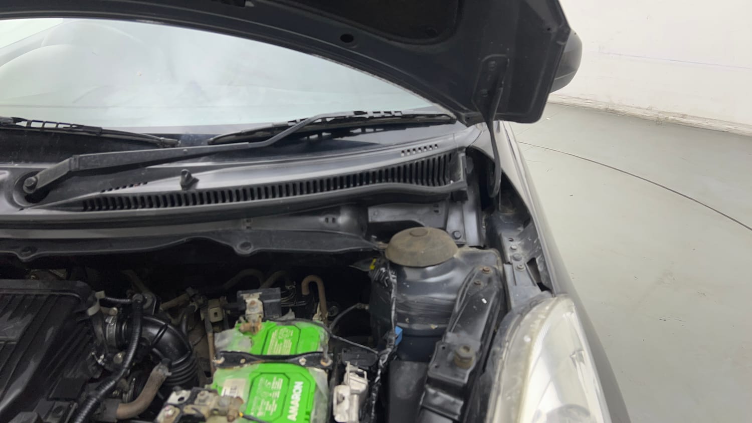 Used 2017 Maruti Suzuki Swift Lxi (O) Petrol Manual engine ENGINE LEFT SIDE HINGE & APRON VIEW