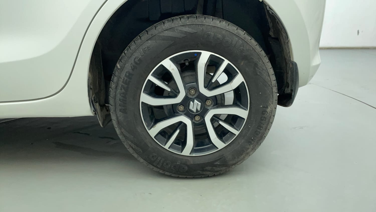 Used 2022 Maruti Suzuki Swift VXi Petrol Manual tyres LEFT REAR TYRE RIM VIEW