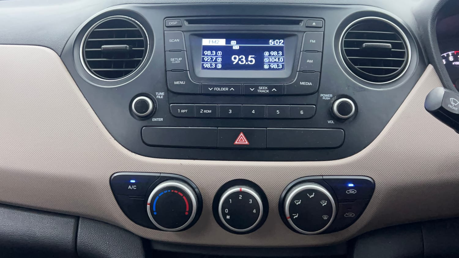 Used 2013 Hyundai Grand i10 Sportz 1.2 Kappa VTVT Petrol Manual interior MUSIC SYSTEM & AC CONTROL VIEW