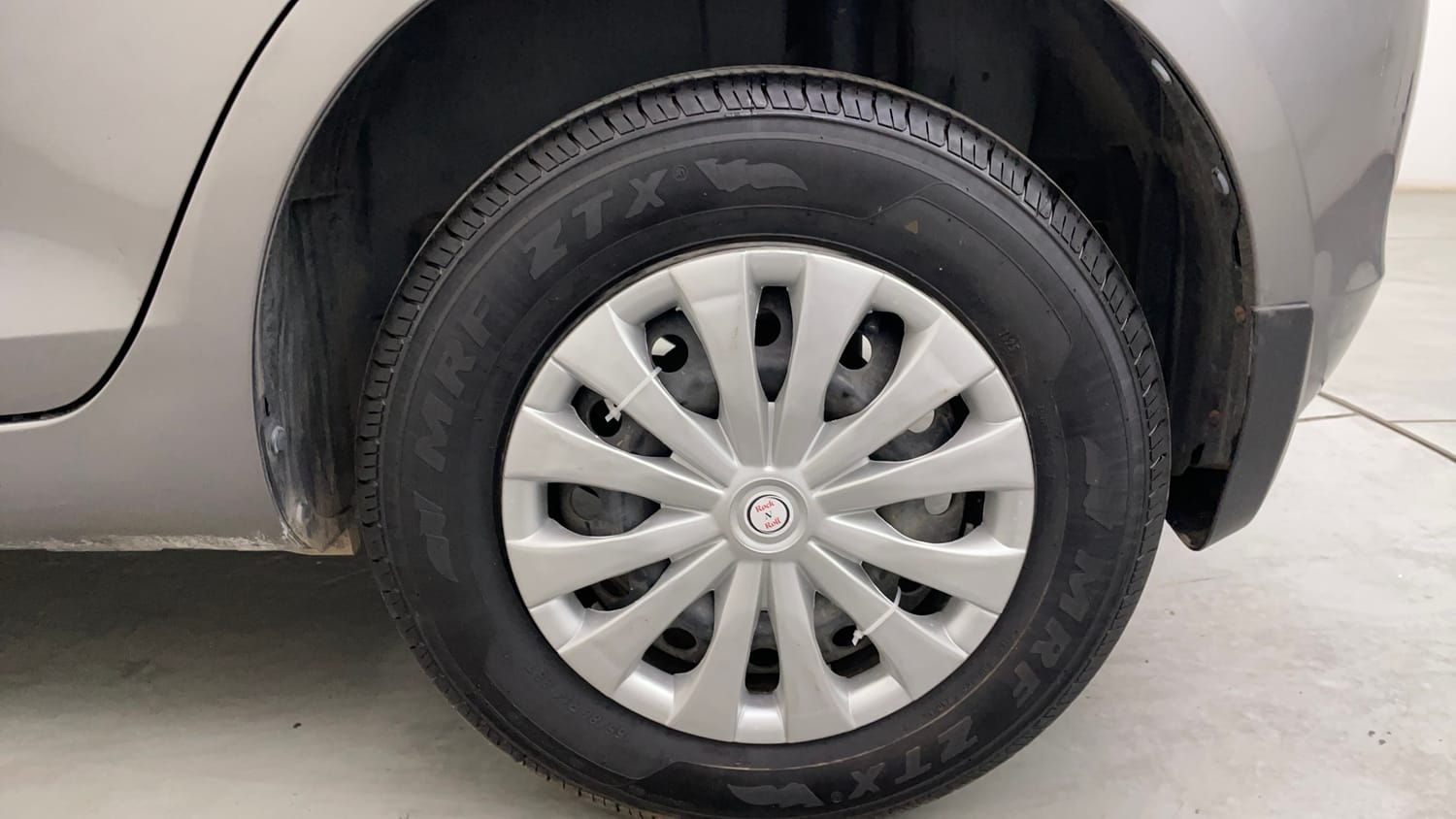 Used 2014 Maruti Suzuki Swift VXi Petrol Manual tyres LEFT REAR TYRE RIM VIEW