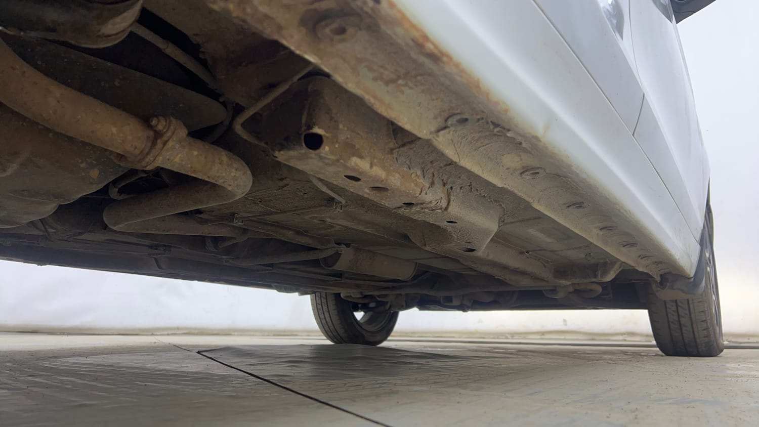 Used 2020 Tata Tigor XZ Plus Petrol Manual extra REAR RIGHT UNDERBODY VIEW