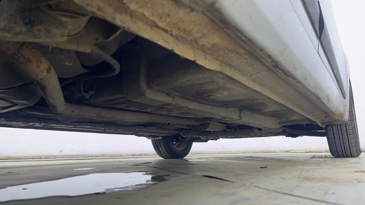Used 2015 Hyundai Xcent S 1.2 (O) Petrol Manual extra REAR RIGHT UNDERBODY VIEW