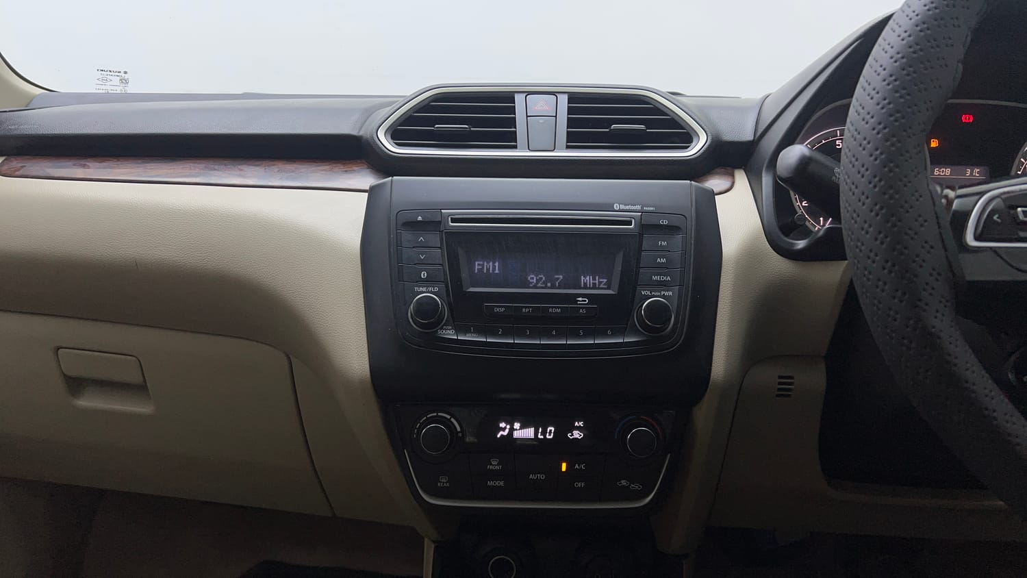Used 2019 Maruti Suzuki Dzire ZXi AMT Petrol Automatic top_features Integrated (in-dash) music system