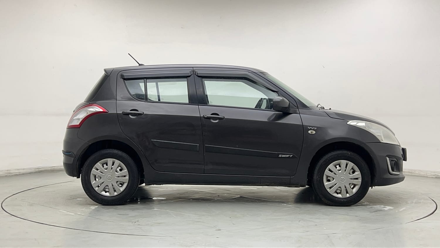 Used 2017 Maruti Suzuki Swift Lxi (O) Petrol Manual exterior RIGHT SIDE VIEW