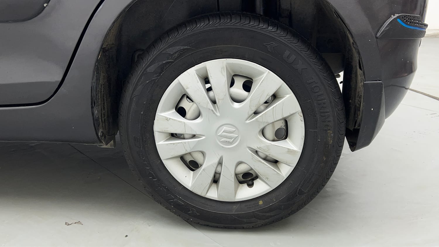 Used 2017 Maruti Suzuki Swift Lxi (O) Petrol Manual tyres LEFT REAR TYRE RIM VIEW