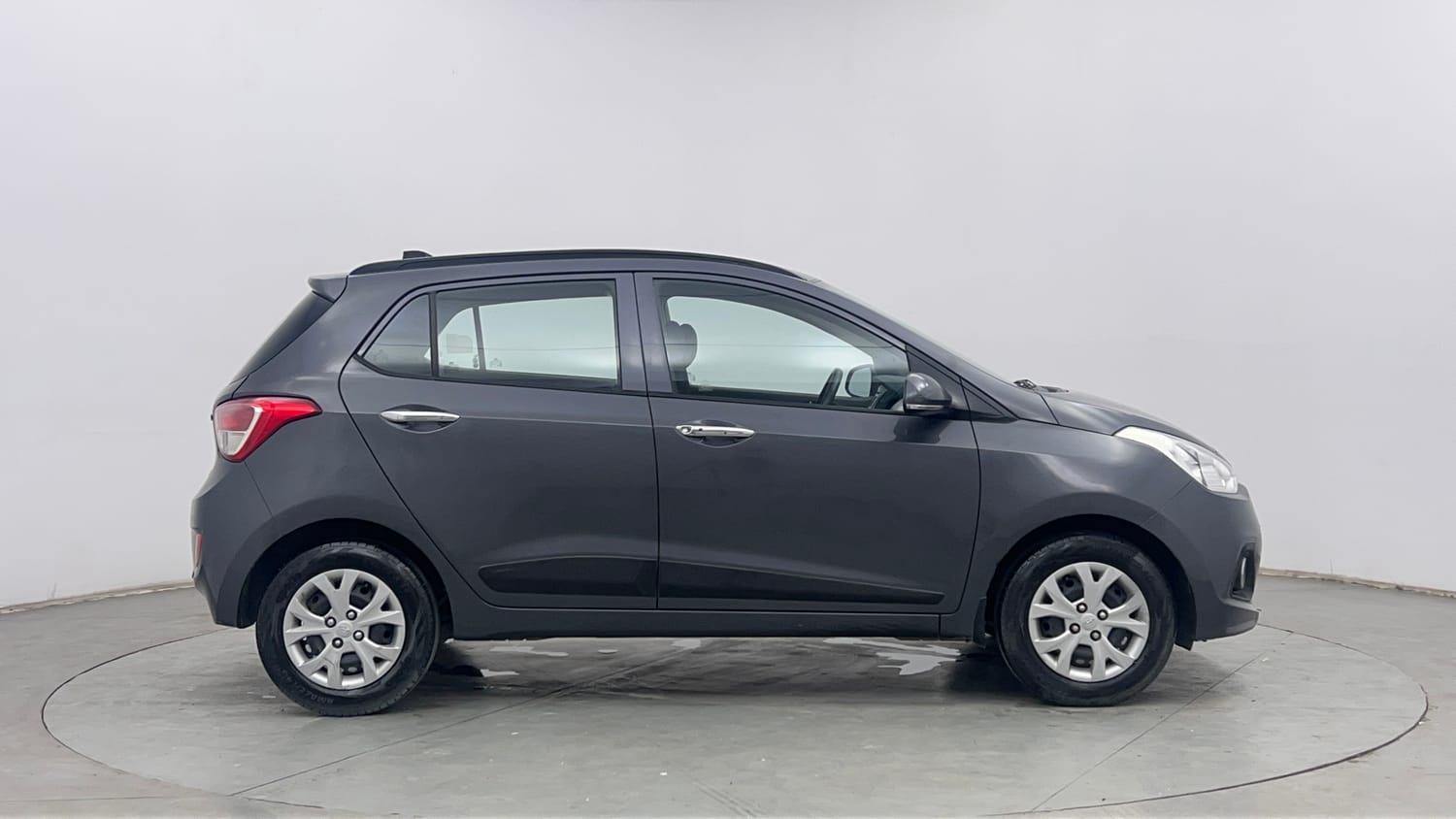 Used 2013 Hyundai Grand i10 Sportz 1.2 Kappa VTVT Petrol Manual exterior RIGHT SIDE VIEW