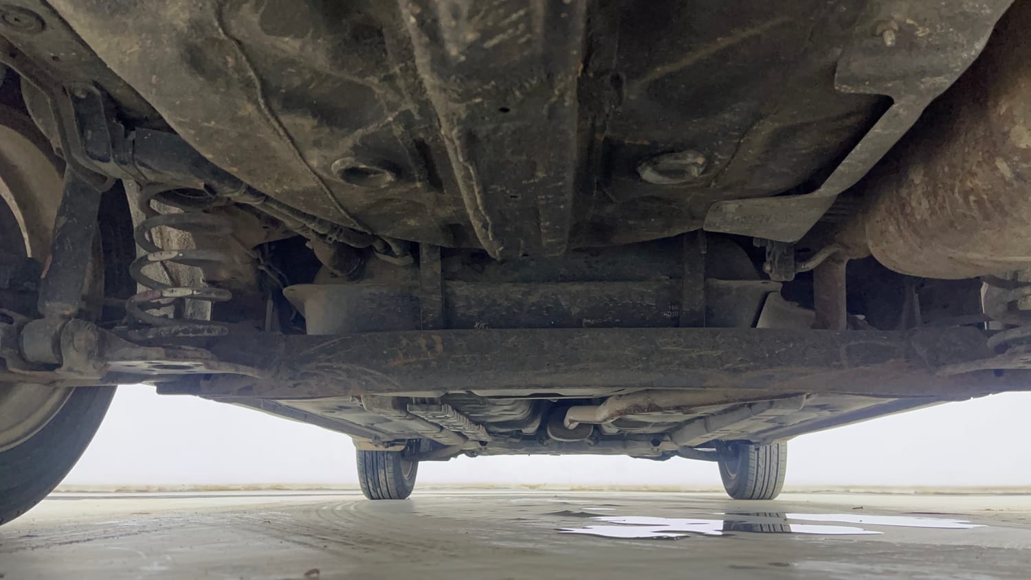 Used 2015 Hyundai Xcent S 1.2 (O) Petrol Manual extra REAR UNDERBODY VIEW (TAKEN FROM REAR)