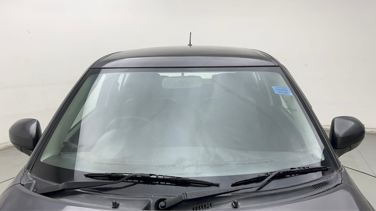 Used 2017 Maruti Suzuki Swift Lxi (O) Petrol Manual exterior FRONT WINDSHIELD VIEW