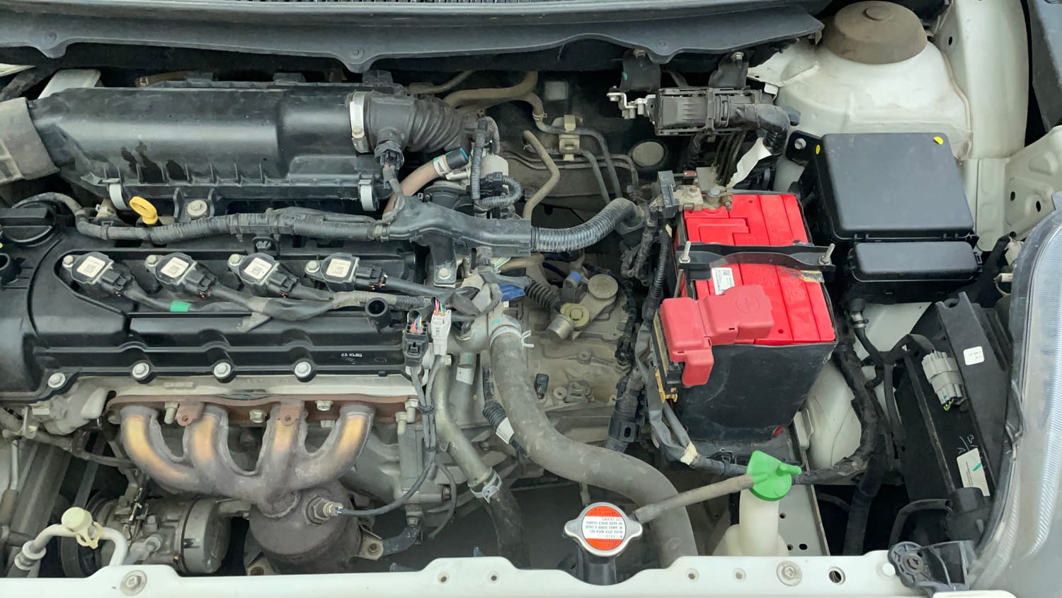 Used 2020 Maruti Suzuki Baleno Zeta Petrol Manual engine ENGINE LEFT SIDE VIEW