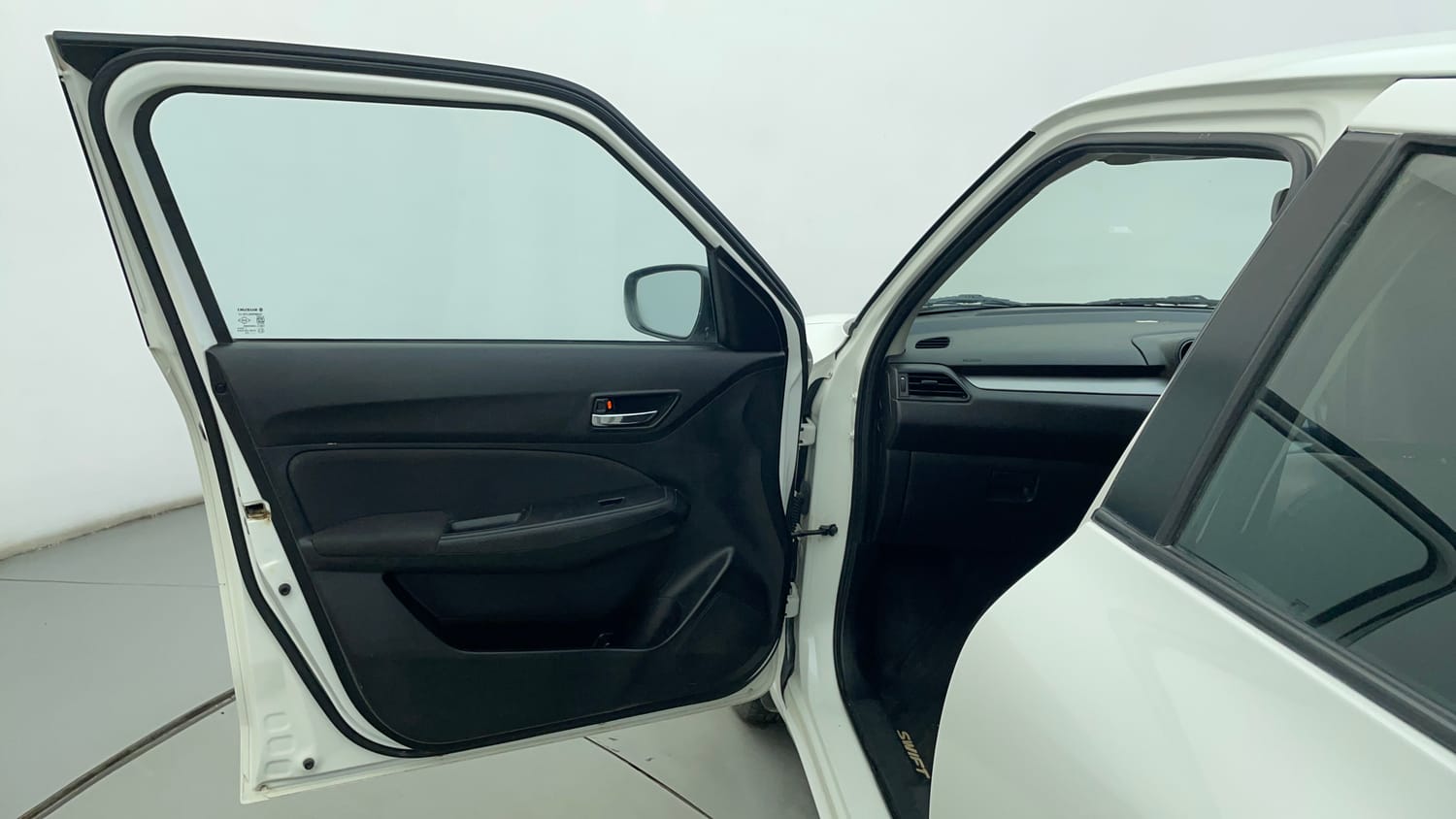 Used 2022 Maruti Suzuki Swift VXi Petrol Manual interior LEFT FRONT DOOR OPEN VIEW
