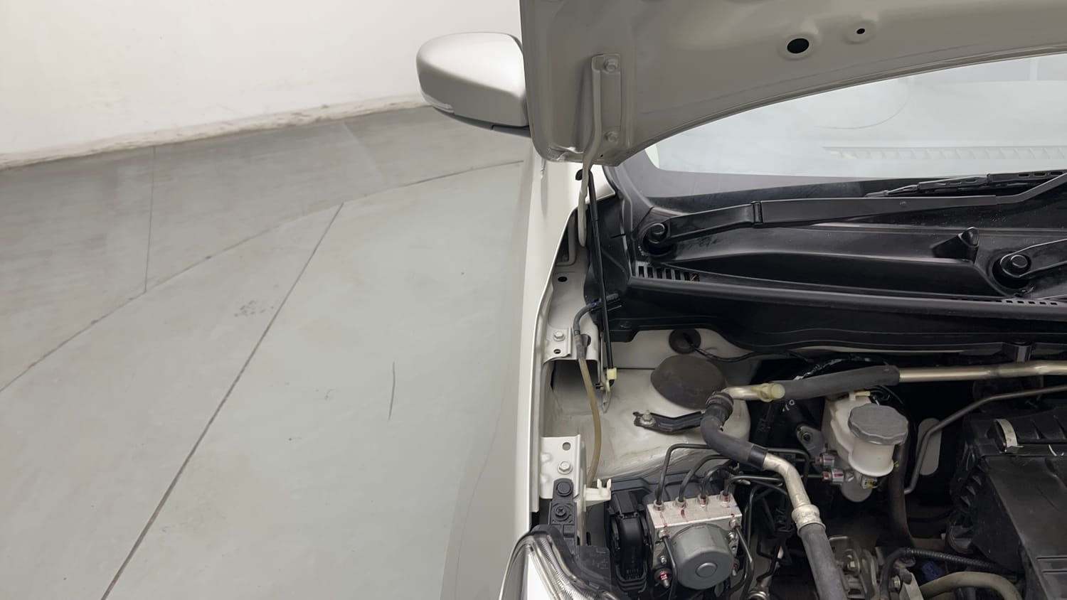 Used 2017 Maruti Suzuki Celerio ZXI (O) AMT Petrol Automatic engine ENGINE RIGHT SIDE HINGE & APRON VIEW