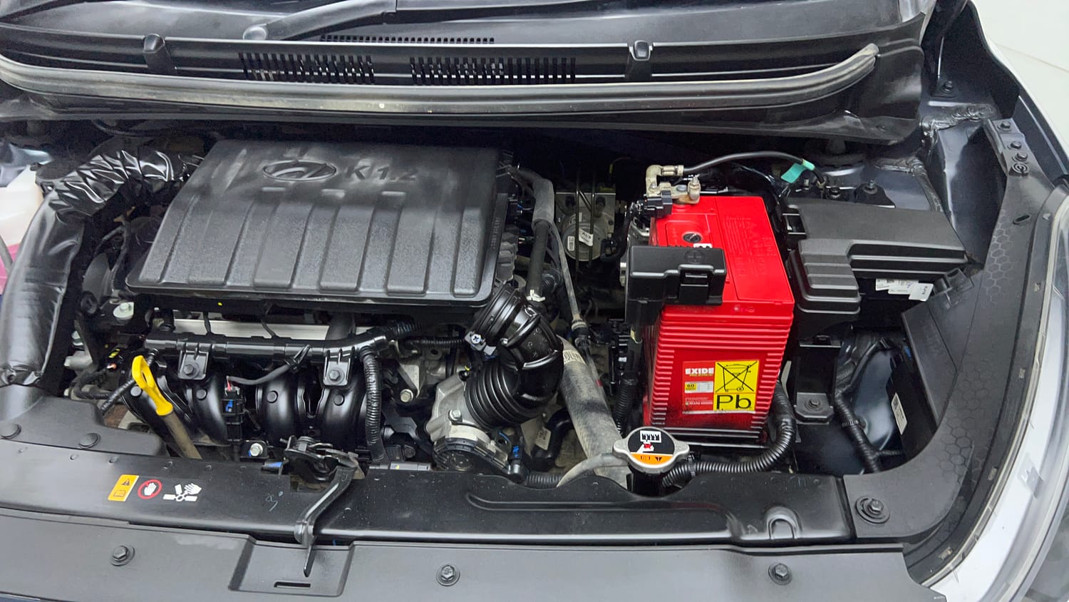 Used 2024 Hyundai Grand i10 Nios Sportz 1.2 Kappa VTVT Petrol Manual engine ENGINE LEFT SIDE VIEW