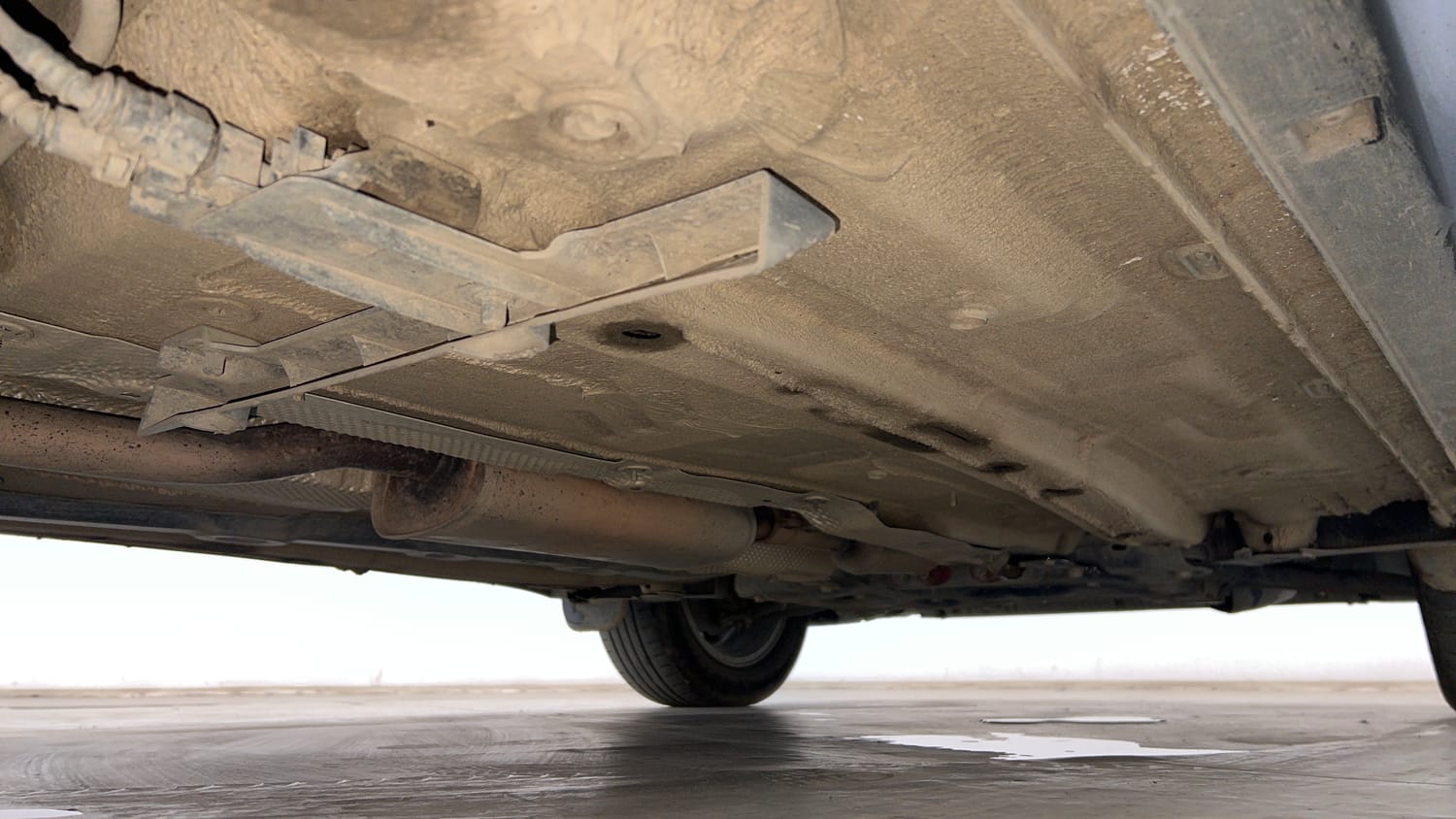 Used 2024 Volkswagen Taigun Highline 1.0 TSI MT Petrol Manual extra REAR RIGHT UNDERBODY VIEW