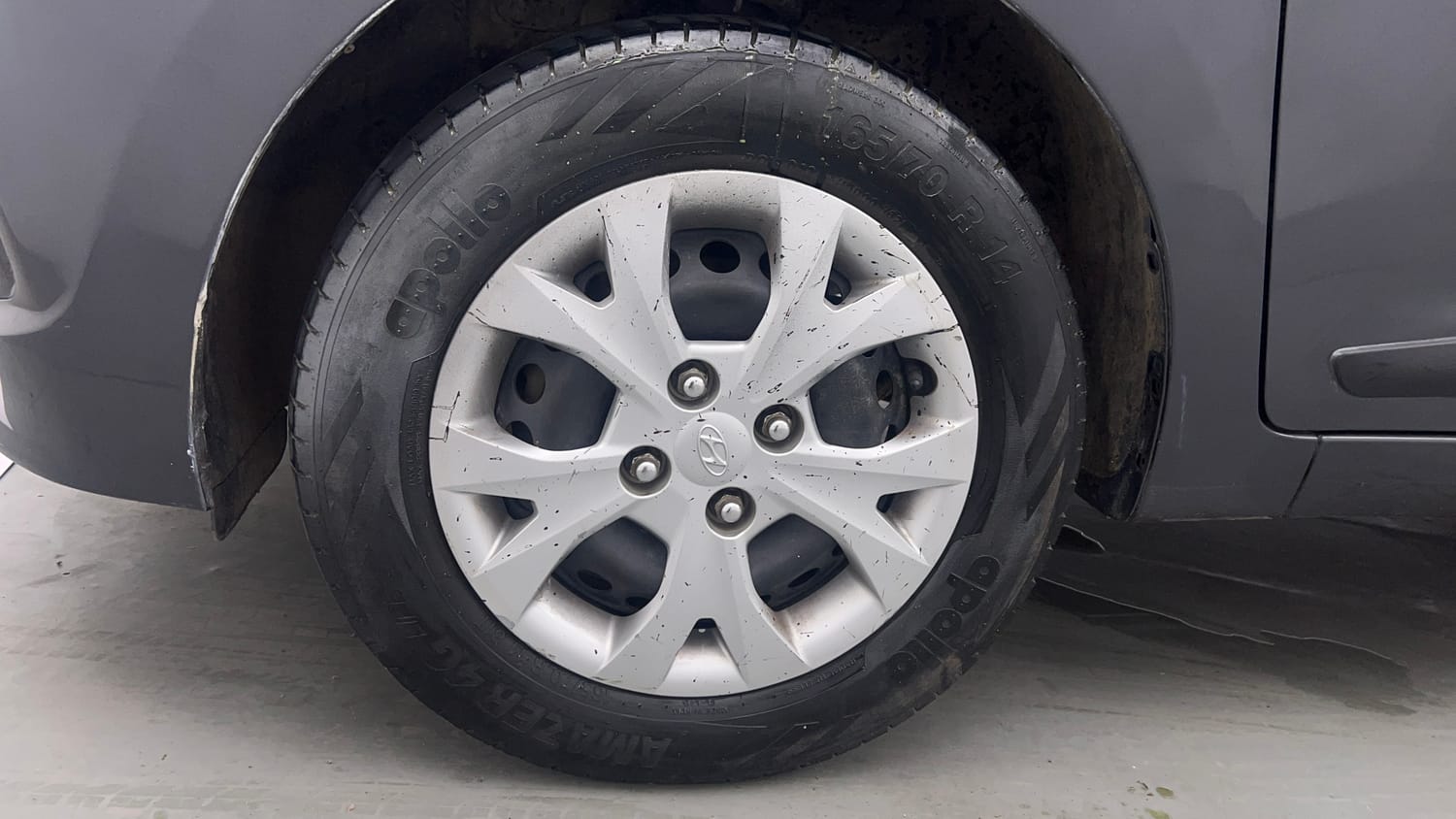 Used 2013 Hyundai Grand i10 Sportz 1.2 Kappa VTVT Petrol Manual tyres LEFT FRONT TYRE RIM VIEW
