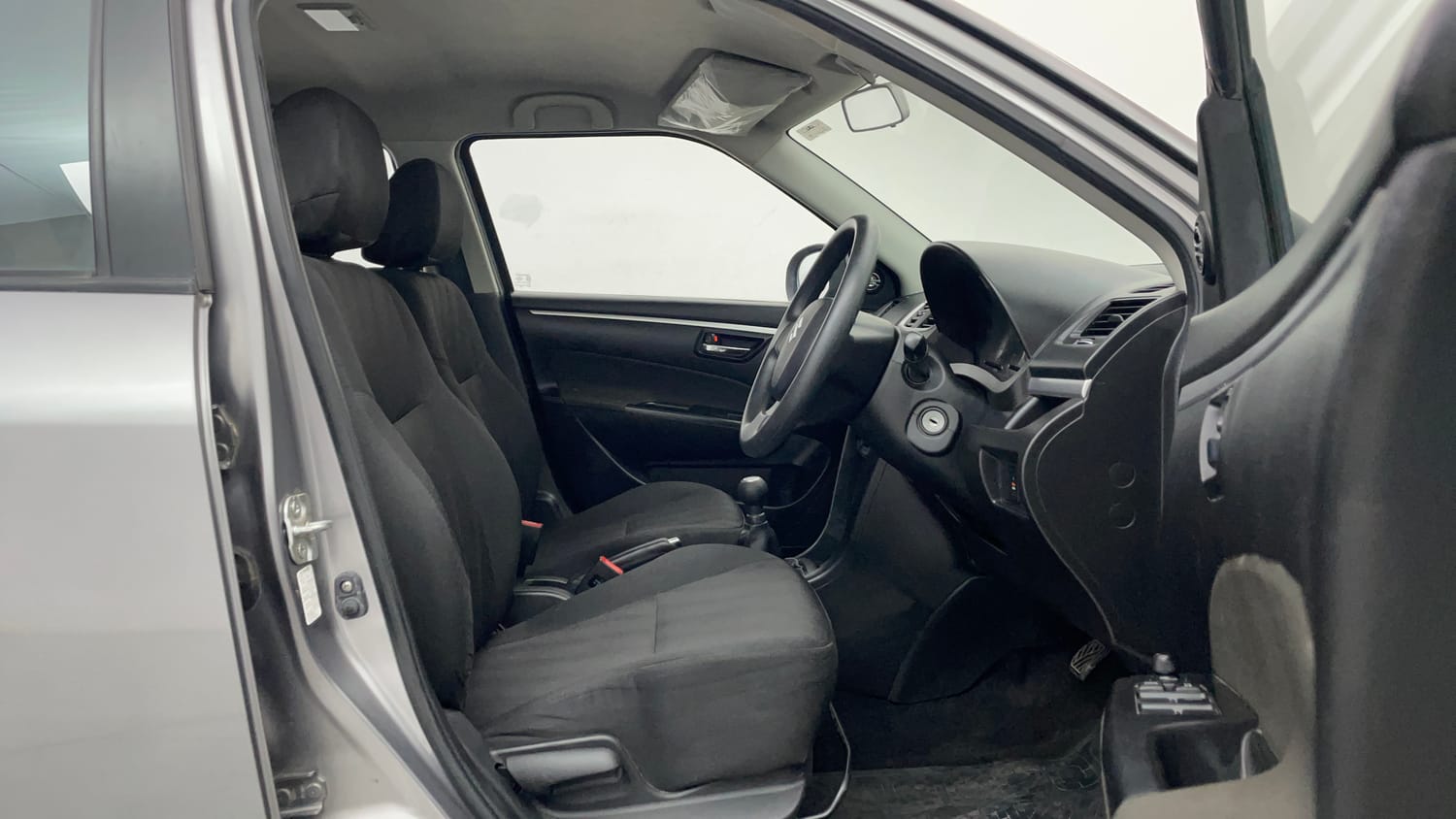 Used 2014 Maruti Suzuki Swift VXi Petrol Manual interior RIGHT SIDE FRONT DOOR CABIN VIEW