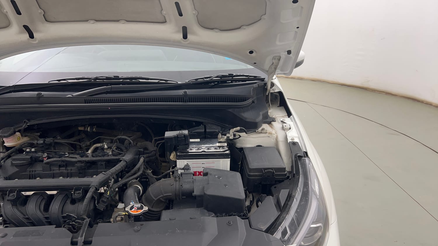 Used 2022 Hyundai New i20 Asta (O) 1.2 MT Petrol Manual engine ENGINE LEFT SIDE HINGE & APRON VIEW