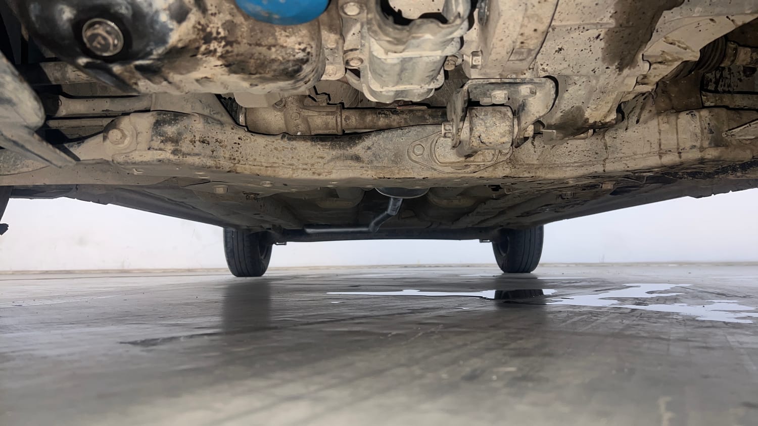 Used 2013 Hyundai Grand i10 Sportz 1.2 Kappa VTVT Petrol Manual extra FRONT LEFT UNDERBODY VIEW