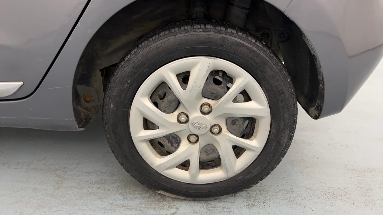 Used 2017 Hyundai Grand i10 Magna 1.2 Kappa VTVT Petrol Manual tyres LEFT REAR TYRE RIM VIEW